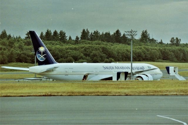 Boeing 777-200 (HZ-AKJ) - KPAE June 1998 shows a new 777-200 for Saudi on the ramp getting final checks and prep for the long flight to Riyadh. Driving around Snohomish County Airport is a real fun event if a jet freak - I highly recommend it if one has never been to the plant. Take every legal street, you'll never know what you'll see.