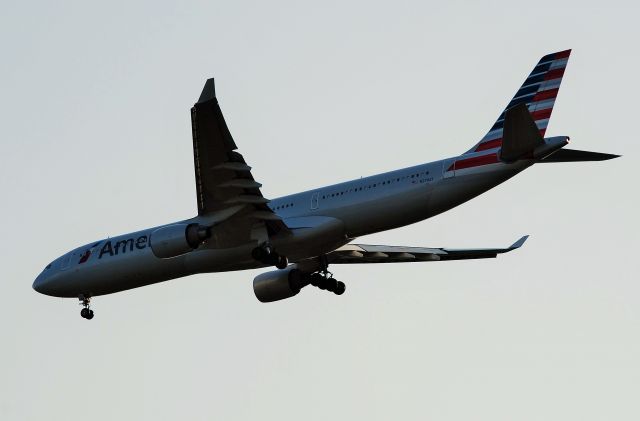 Airbus A330-300 (N276AY) - n approach for runway 18C, flying over the West Meck H.S. baseball field - 6/25/15