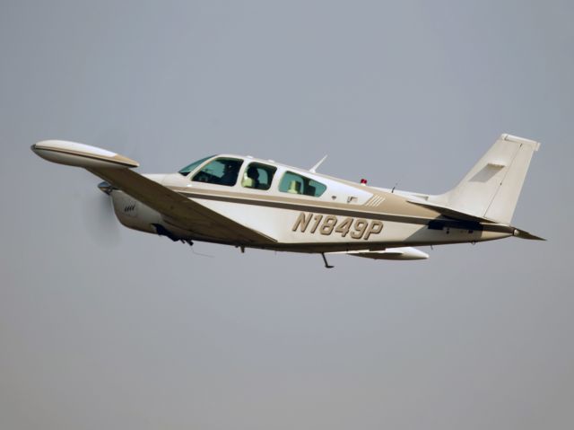 Beechcraft Bonanza (36) (N1849P) - Take off runway 26.