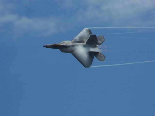 Lockheed F-22 Raptor (04-0080) - F-22 Raptor 04-0080 pulls some Gs during a display at the Rhode Island Air National Guard Open House. This was the first time an F22 had appeared at the show! A second F22 was parked on the ramp!