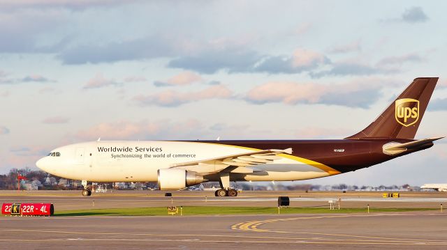 Airbus A300F4-600 (N146UP) - 2nd photo ever uploaded of N146F on FlightAware.Com.  The golden hour @ KBOS Logan !