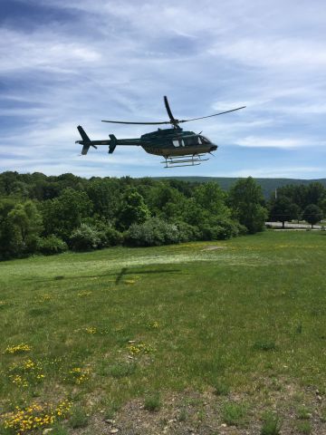 Bell 407 (N407J) - N407J doing a off field landing near IPT at our friends house.