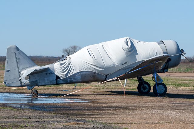 N7984C — - A lonesome SNJ-6 looking pretty tired on ramp at Caddo Mills.