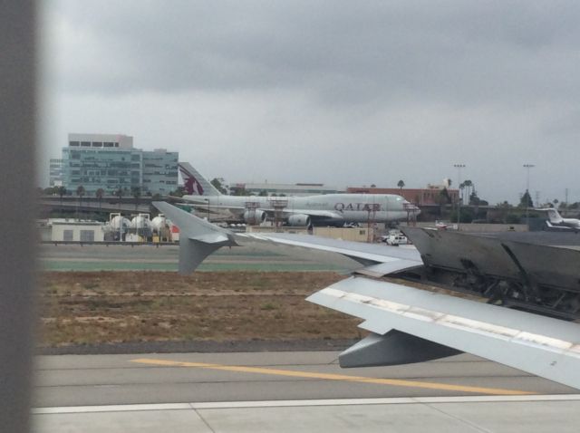 BOEING 747-8 (A7-HHE) - The first 747-8 I have seen in person