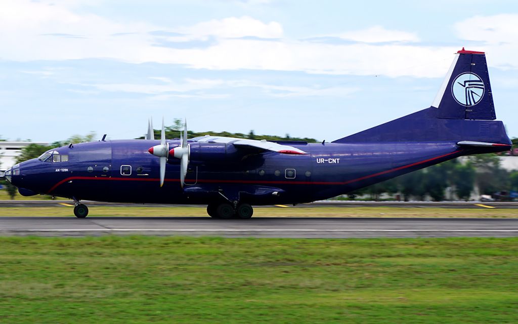 Antonov An-12 (UR-CNT) - Rare traffic at UPG.