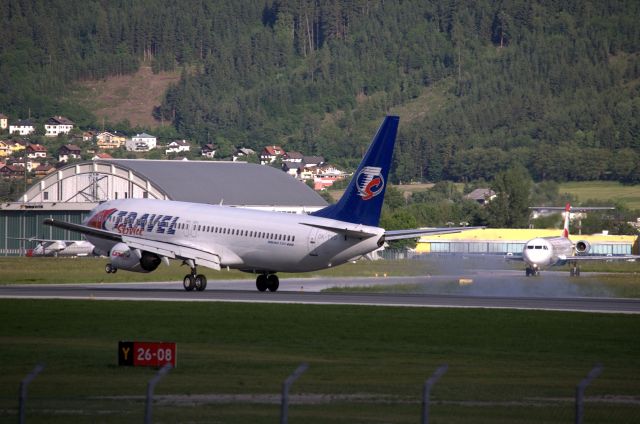 Boeing 737-800 (OK-TVD) - landing 737 from Paris CDG and Fokker 100 waiting for departure to Vienna