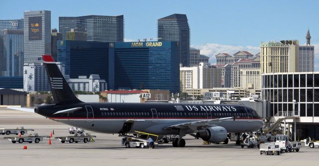 Airbus A321 (N178US) - Flashback to 2009 ~~br /Not much doubt which airport this is.  (lol)br /N178US flies today in AA paint.  