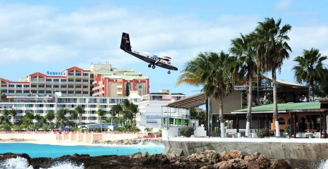 De Havilland Canada Twin Otter (PJ-WII) - STOL over MAHO BEACH on a perfect day.