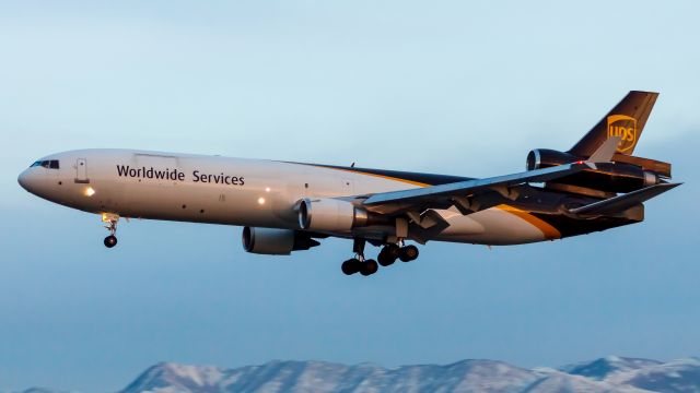 Boeing MD-11 (N253UP) - This UPS MD-11 is about to make an amazing golden hour touchdown onto 34R