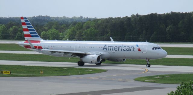 Airbus A321 (N152AA) - New A321 taxiing out right before a storm hit RDU, 4/22/17.  Interesting choice - the 738 is usually used to MIA, but we had an Airbus this time around.