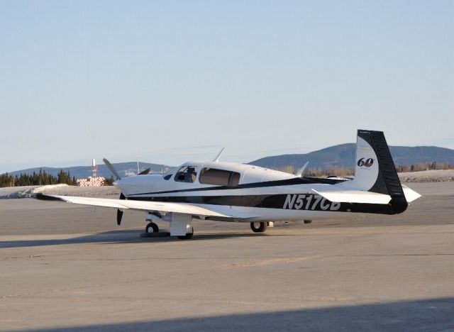 Mooney M-20 (N517CB) - 2006 Mooney20R S/N 29-0466 60th Anniversary parked at Woodwards Aviation.