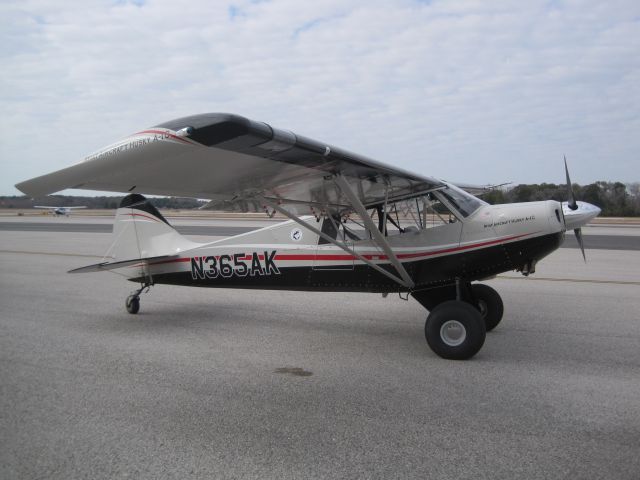 CHRISTEN Husky (N365AK) - Aviat Husky with tundra tires parked in Tampa during a LONG X-country from Alaska to South America.