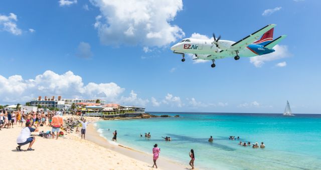 Saab 340 (N304AG) - EZAIR over the beach doing touch and goes before rtb.