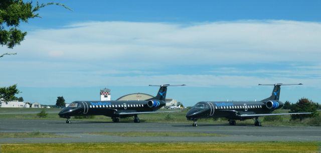 Embraer ERJ-145 (N832HK) - To the left catching some tarmac time is this 2003 RoadRunAir Embraer ERJ-145LR in the Autumn of 2022. On the right is N835HK same model aircraft.