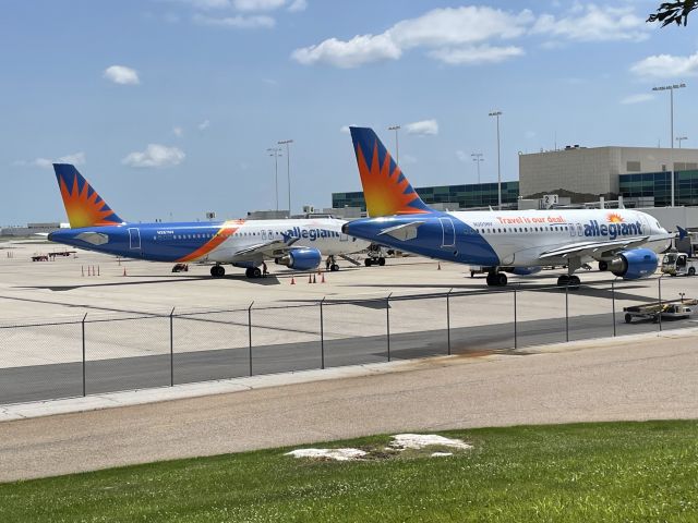 Airbus A319 — - First time seeing two Allegiant Airbuses at the same time in nearly seven months! Even though they were next to each other for a good two minutes. LOL   Date - Jun 18, 2022