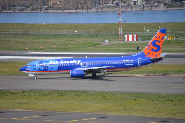 Boeing 737-800 (N813SY) - "Lake Winona" operating as SCX8682 exiting 28R after arriving from Spokane (KGEG/GEG) before taxiing over the FBO ramp. A 737-800 without winglets is a pretty rare sight these days!