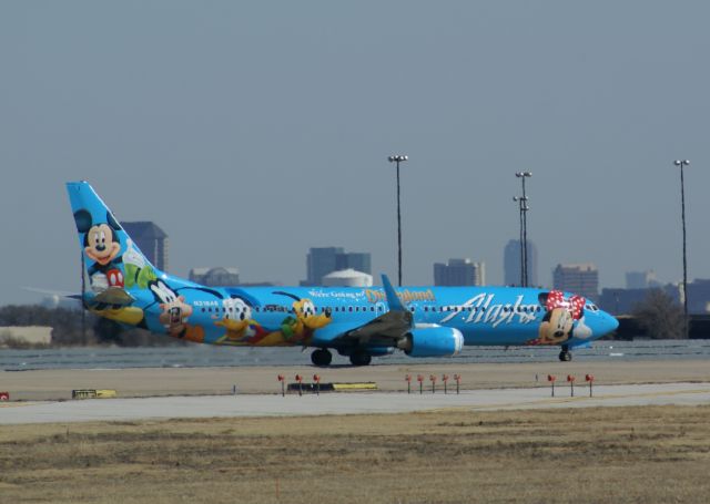 Boeing 737-700 (N310AS) - Alaska Airlines "Disneyland" plane at KDFW ready to take off.