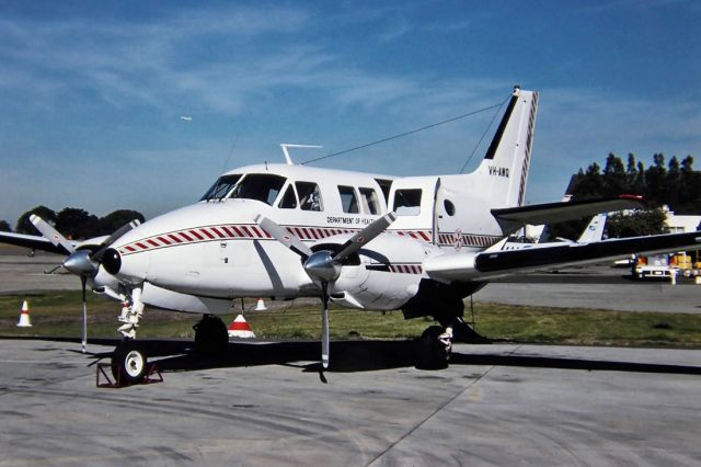 Beechcraft Super King Air 200 (VH-AMQ) - DEPARTMENT OF HEALTH - BEECHCRAFT B-65-B80 QUEEN AIR - REG : VH-AMQ (CN LD-443) - KINGSFORD SMITH SYDNEY NSW. AUSTRALIA - YSSY - 27/6/1988 35MM SLIDE CONVERSION USING A LIGHTBOX AND A NIKON L810 DIGITAL CAMERA IN THE MACRO MODE