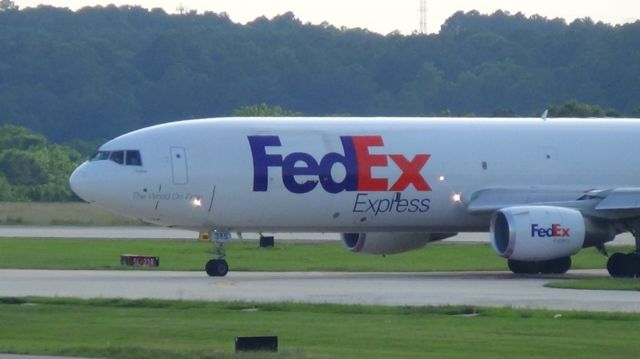 McDonnell Douglas DC-10 (N385FE) - FedEx 765 arriving from Memphis at 6;56 P.M.   Taken June 7, 2015.