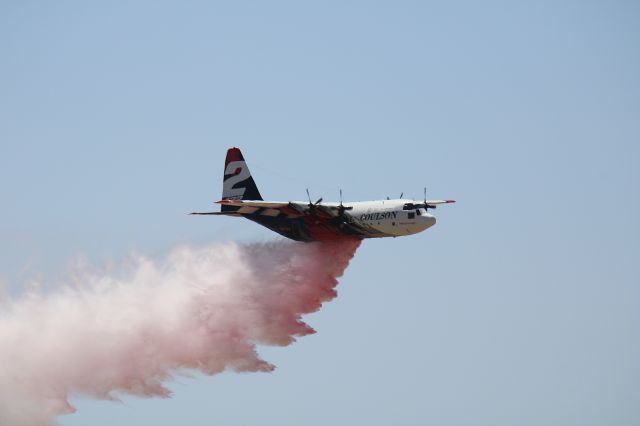 Lockheed C-130 Hercules (N132CG) - BMBR132 dumping a load of water after not fighting a fire for a week.