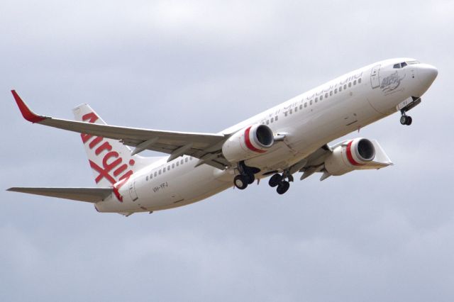 Boeing 737-800 (VH-YFJ) - Getting airborne off runway 23. Friday 1st February 2013.