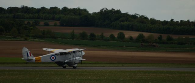 De Havilland Dragon Rapide (G-AIYR) - Sightseeing flight taking off from Duxford.