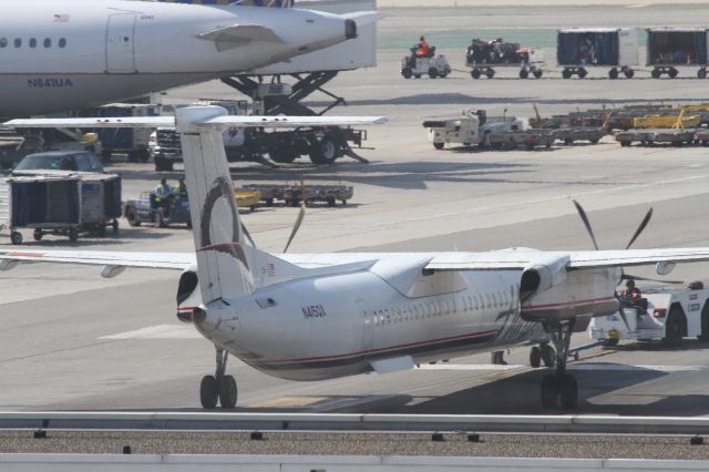 de Havilland Dash 8-400 (N415QX) - PUSH BACK FORM GATE FOR TAXING