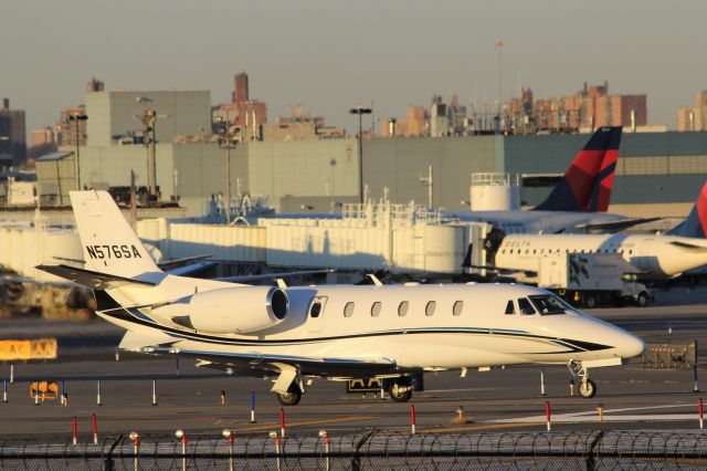 Cessna Citation Excel/XLS (N576SA) - New York LaGuardia (LGA). Built in 2009 and owned by Cincinnati OH based aerospace parts supplier SOSCO Aviation. Pictured catching the final rays of winter sunshine prior to take off taken from Planeview Park, 23rd Avenue at the end of Runway 4/22br /2017 11 29  a rel=nofollow href=http://alphayankee.smugmug.comhttps://alphayankee.smugmug.com/a