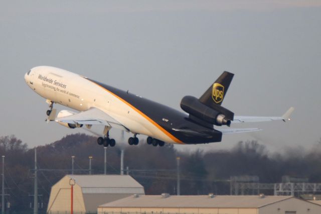 Boeing MD-11 (N274UP) - UPS9304 departing RWY 24R for Louisville Intl (KSDF) after a delay on Sat 2 Dec 2017. 