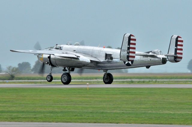 North American TB-25 Mitchell (NL1042B) - 09-04-21 Departing in the pouring rain.