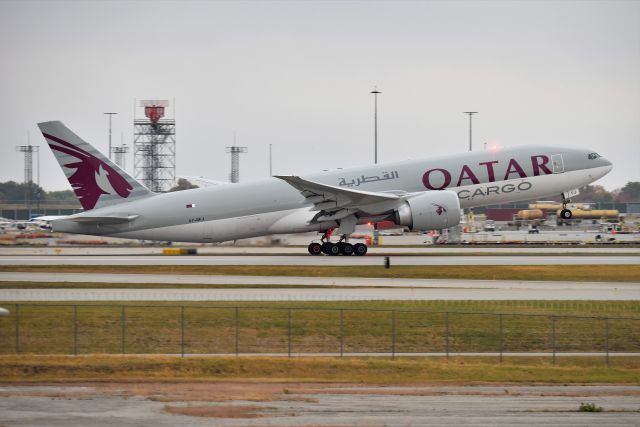 BOEING 777-200LR (A7-BFJ) - FLT 8111 MXP-ORD Diverted to IND on 10-12-20 due to ORD WX. Here she is shown departing 23-L back to ORD. Thanks for the double-beacon flash!