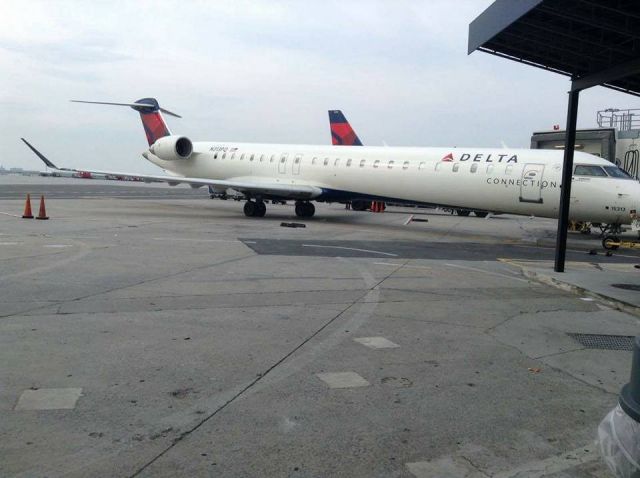 Canadair Regional Jet CRJ-900 (N313PQ) - Aeropuerto Internacional John F. Kennedy br /Delta AirLines at Terminal 4 