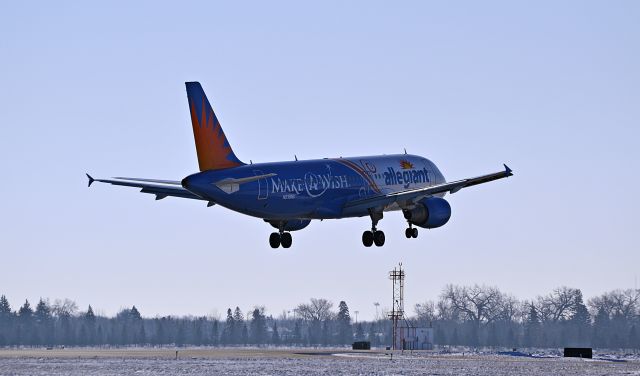 Airbus A320 (N218NV) - Make-A-Wish landing on runway 18 in Fargo, ND (2/19/15)