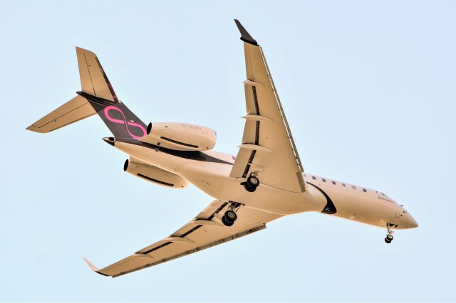 Bombardier Global 5000 (N755RA) - Global 5000 over Quincy, on approach to Boston.