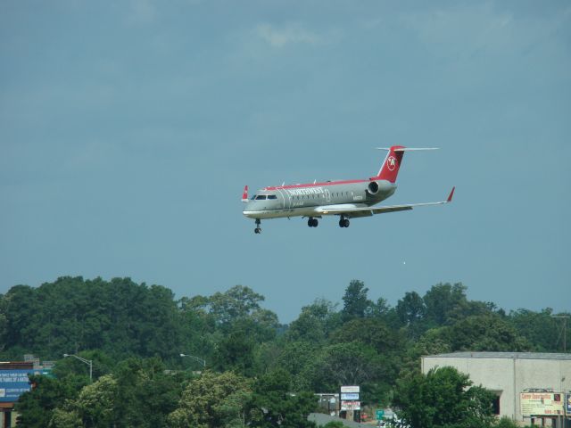 Canadair Regional Jet CRJ-200 (N8665A) - Pinnacle Airlines making final approach to RWY 14 at Shreveport Regional as viewed from the control tower.