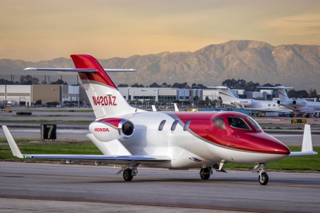 Honda HondaJet (N420AZ) - HondaJet departing Long Beach Airport just before sunset.