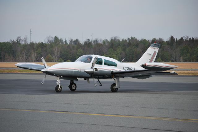 Cessna 310 (N1918J) - Parking at Concord Regional Airport (Concord, NC) - 2/10/09