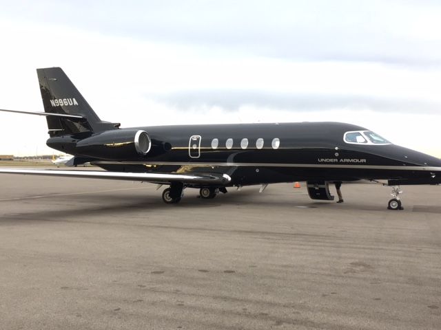 Cessna Citation Sovereign (N996UA) - UnderAmour pulled up next to our little Lear 35 in MSP. 