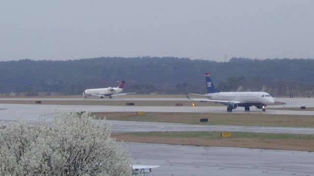 Embraer ERJ 175 (N124HQ) - U.S. Airways (Republic) 4619 departing to Reagan National at 3:40 P.M.  Taken March 19, 2015.