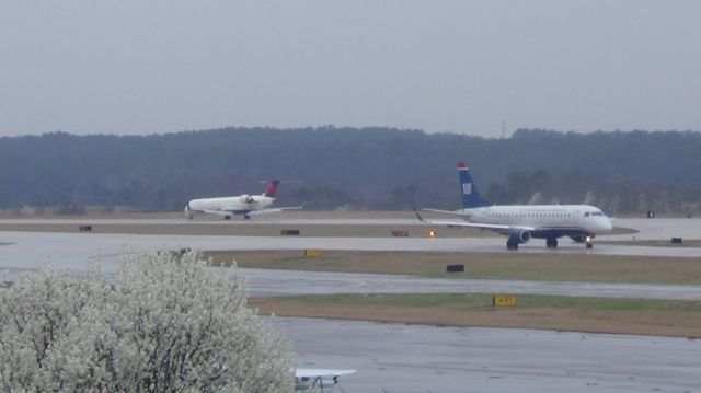 Embraer ERJ 175 (N124HQ) - U.S. Airways (Republic) 4619 departing to Reagan National at 3:40 P.M.  Taken March 19, 2015.