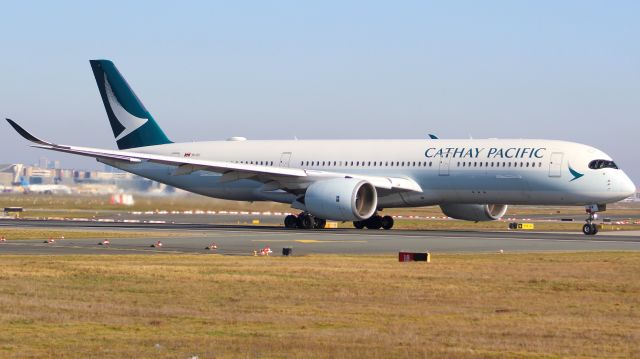 Airbus A350-900 (B-LRA) - A Cathay Pacific A350-900 taking off from Frankfurt Airport.br /br /Location: Viewpoint "West Runway"/Aussichtspunkt "Startbahn West".br /Date: 13.02.23 (dd/mm/yy).