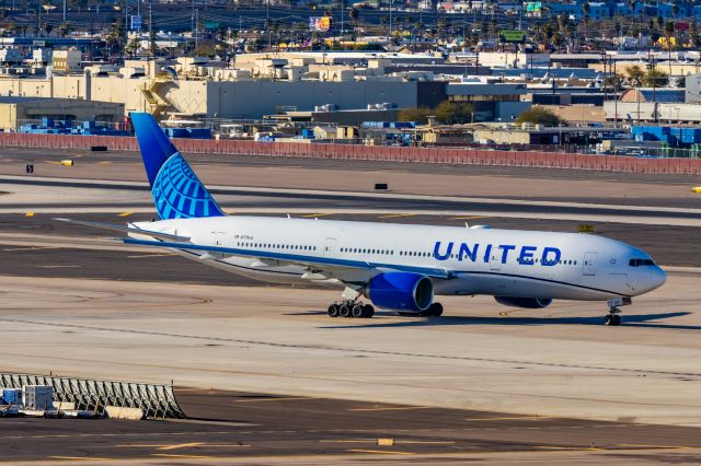 Boeing 777-200 (N775UA) - An United Airlines 777-200 taxiing at PHX on 2/9/23 during the Super Bowl rush. Taken with a Canon R7 and Tamron 70-200 G2 lens.