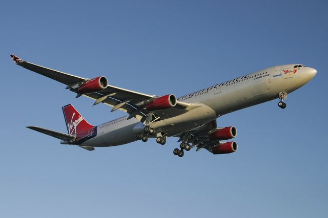 Airbus A340-300 (G-VSEA) - A Virgin Atlantic airlines Airbus A-340 on short final to LAX.