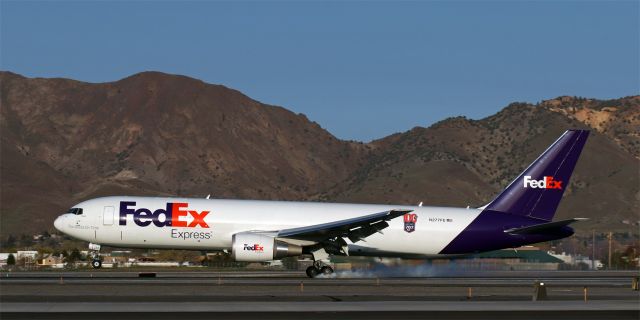 BOEING 767-300 (N277FE) - Fed Ex's "Ariella" (N277FE), wearing the "100th Boeing 767 FedEx" sticker, makes an early evening landing on Runway 34L.