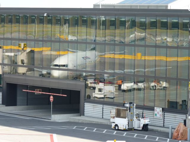 Boeing 737-200 (C-FACP) - reflection in terminal windows of First Air 737