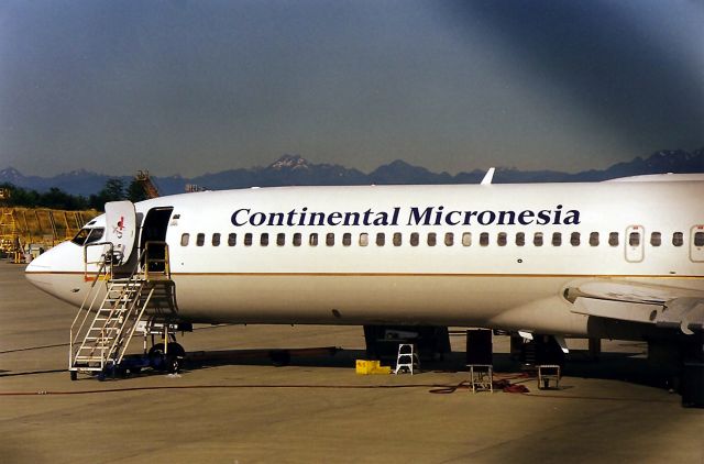 BOEING 727-200 — - KPAE - 1999 view and no Reg- this Continental Mike was undergoing some serious retro fitting. This is the only Continental Mic I had ever seen in person.