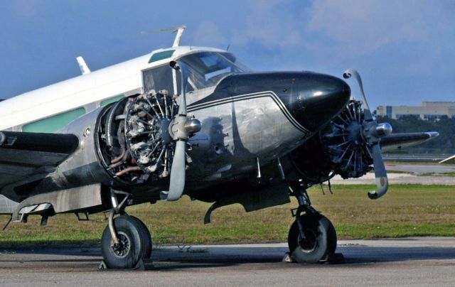 N1480K — - Propellers bent an a small fire occured after main gear collapsed upon landing. 