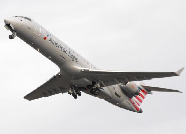 Canadair Regional Jet CRJ-700 (N502AE) - Blue Streak CRJ-700 departing RWY 27