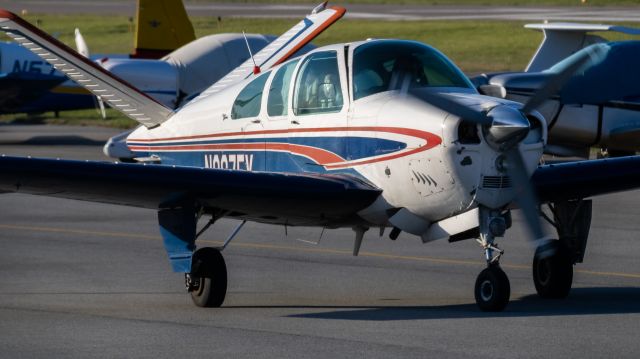 Beechcraft 35 Bonanza (N9675Y) - N9675Y finding a parking spot after smoothly touching down on College Park Airport's runway 33 