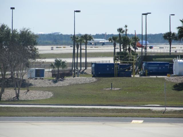 BOEING 757-300 (N589NW) - From gate 128 in KMCO terminal